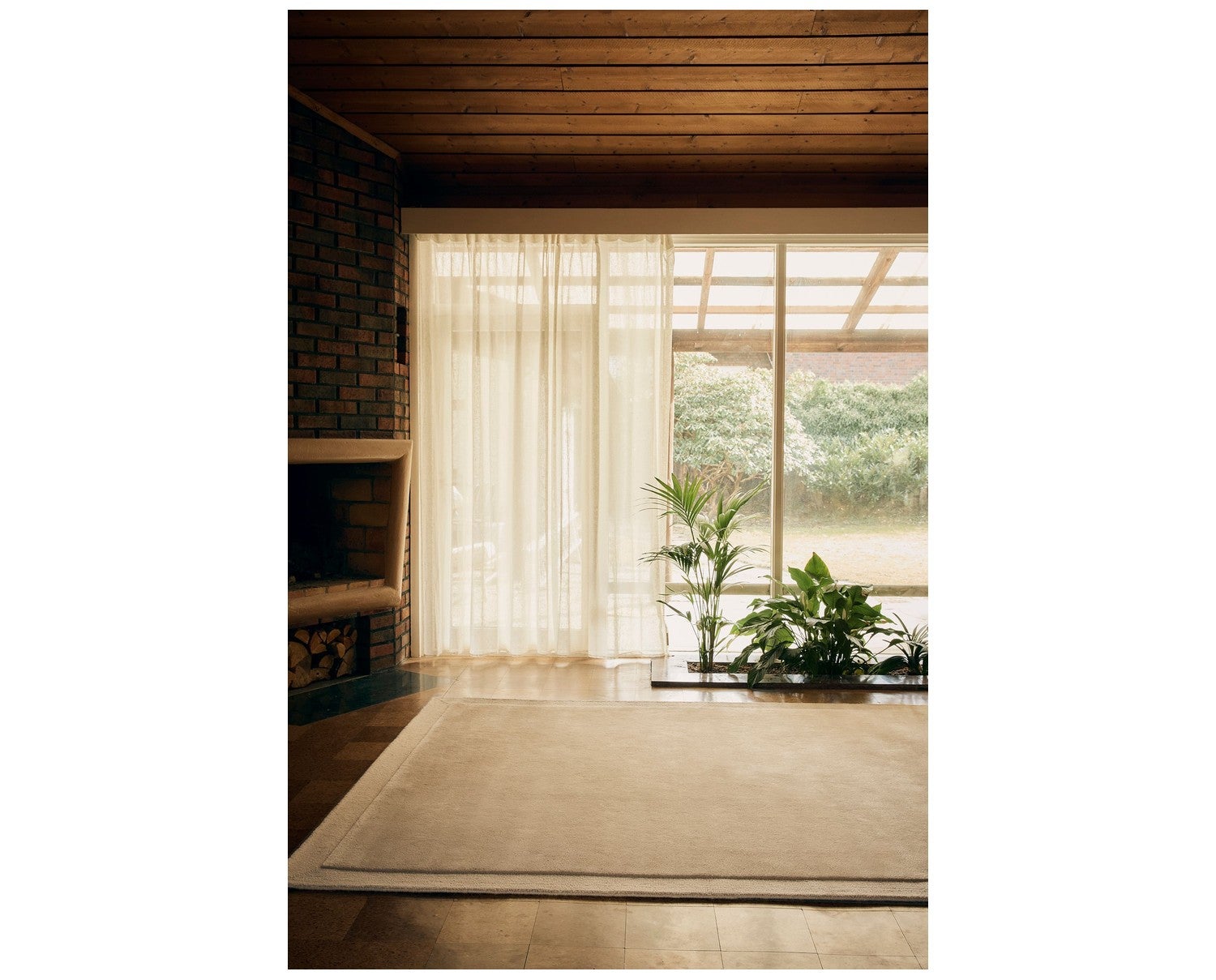 Louis Wool Rug Warm Beige från Tinted Objects.